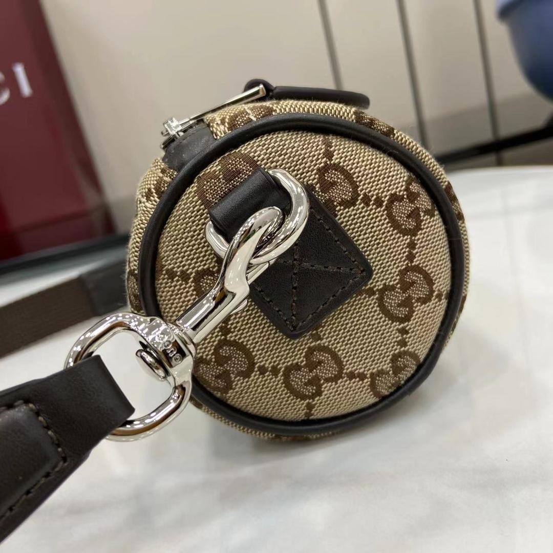 Gucci GG Canvas Mini Cylinder Bag - 