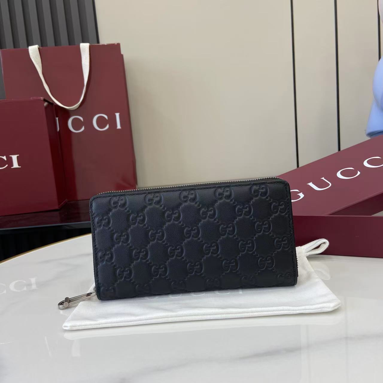 Gucci GG Emblem Zip Around Wallet - DesignerGu