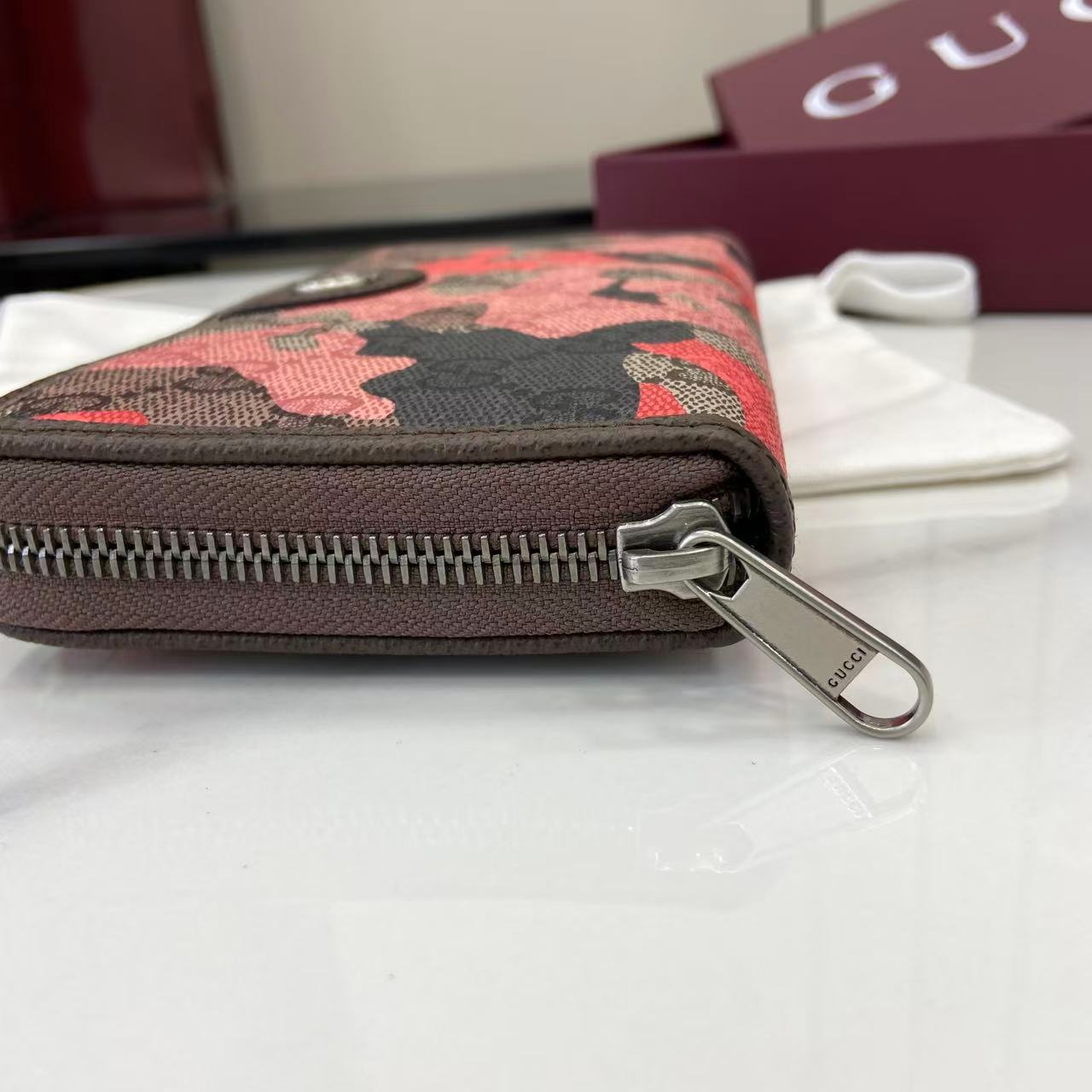 Gucci GG zip-around Wallet - DesignerGu