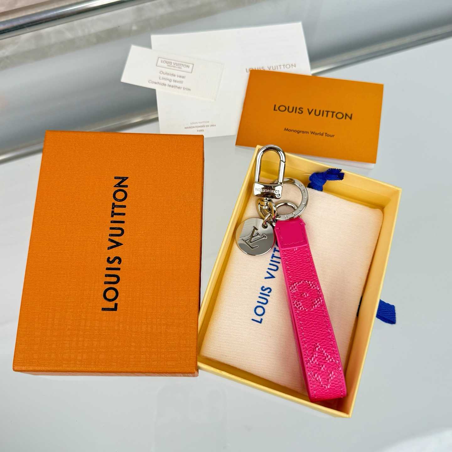 Louis Vuitton LV Slim Dragonne Key Holder and Bag Charm S00  - DesignerGu