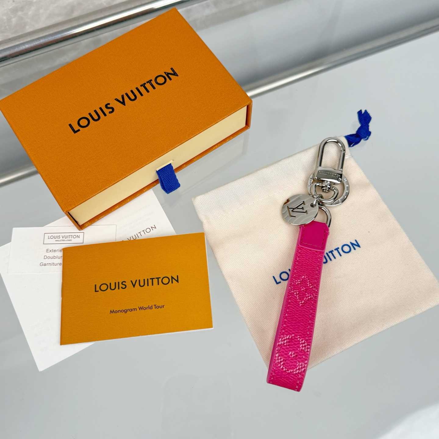 Louis Vuitton LV Slim Dragonne Key Holder and Bag Charm S00  - DesignerGu