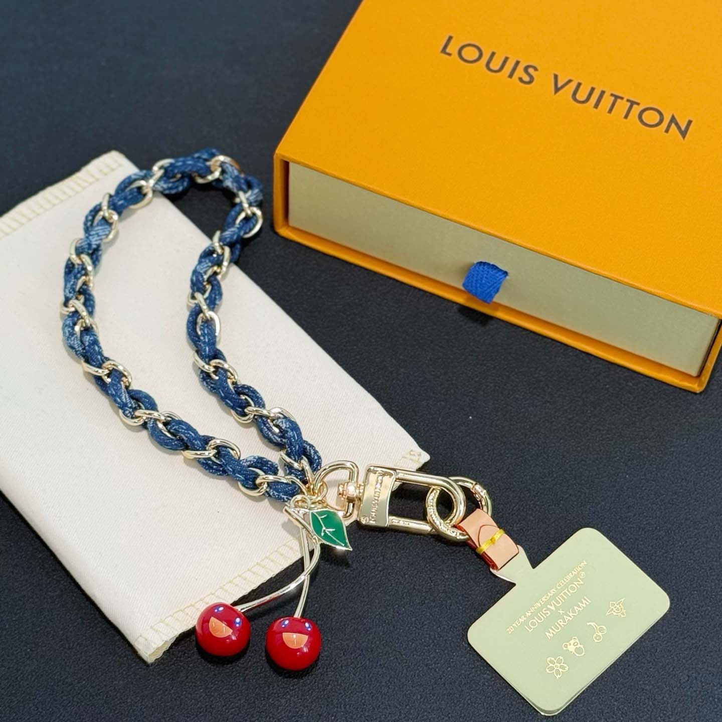 Louis Vuitton LV x TM Denim Cerise Phone Holder S00   M02623 - DesignerGu