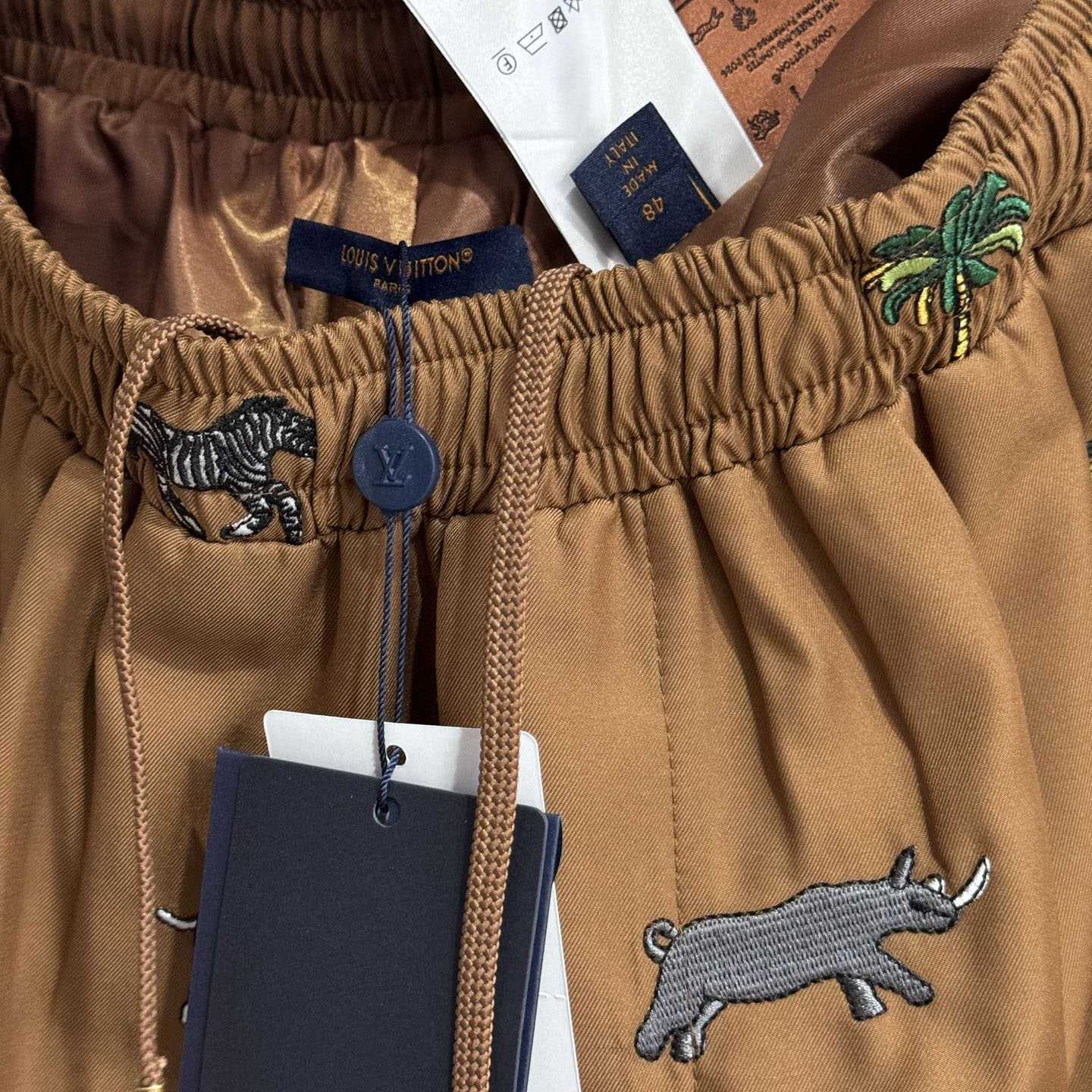 Louis Vuitton LV x The Darjeeling Limited Fil Coupe Drawstring Pants   1AJUMF - DesignerGu