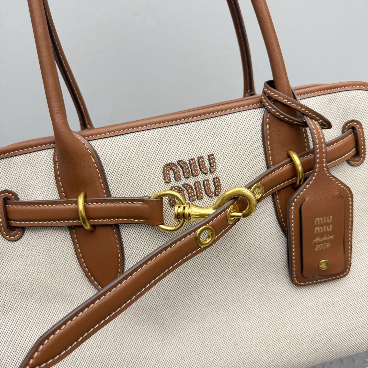 Miu Miu Aventure Canvas And Leather Bag - DesignerGu