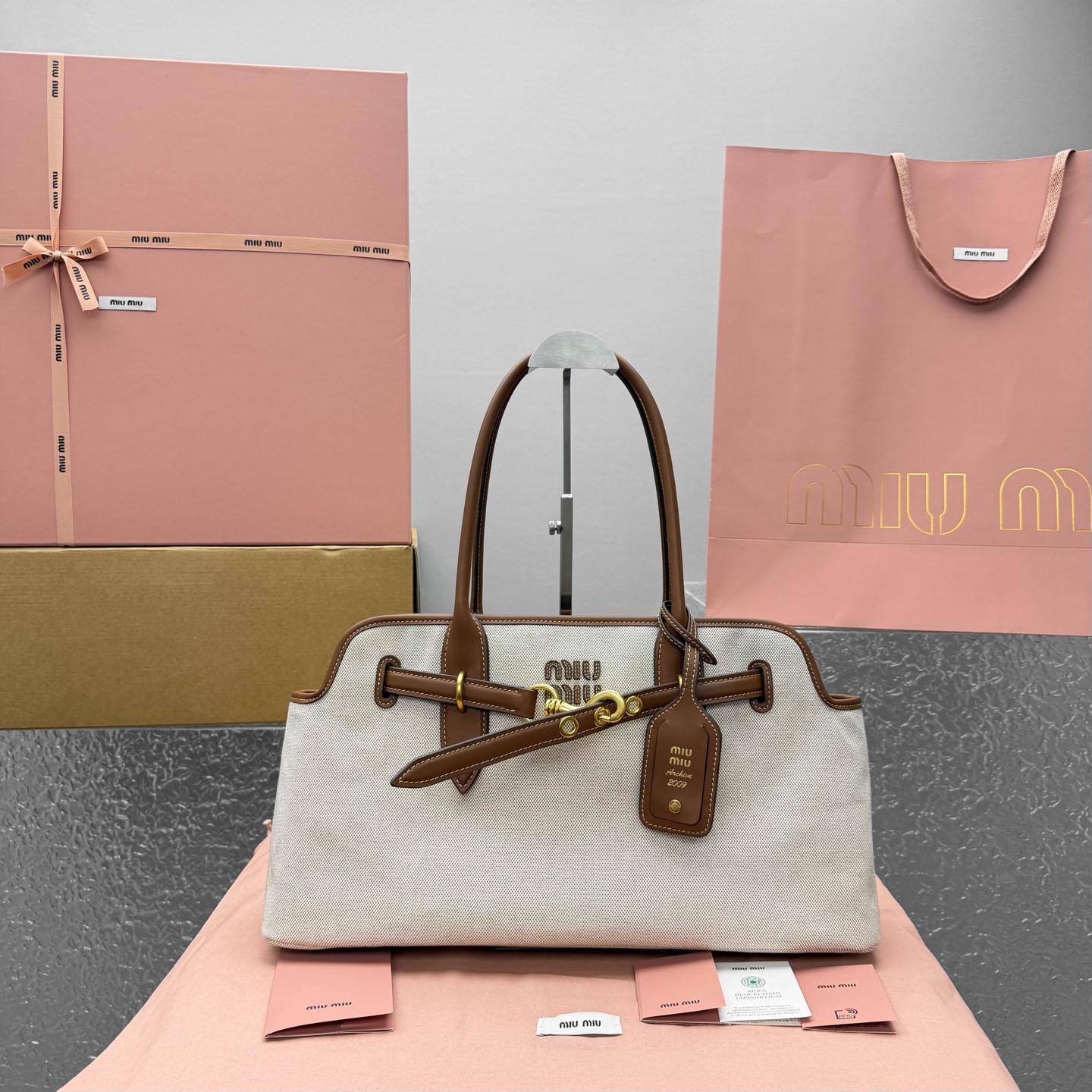 Miu Miu Aventure Canvas And Leather Bag - DesignerGu