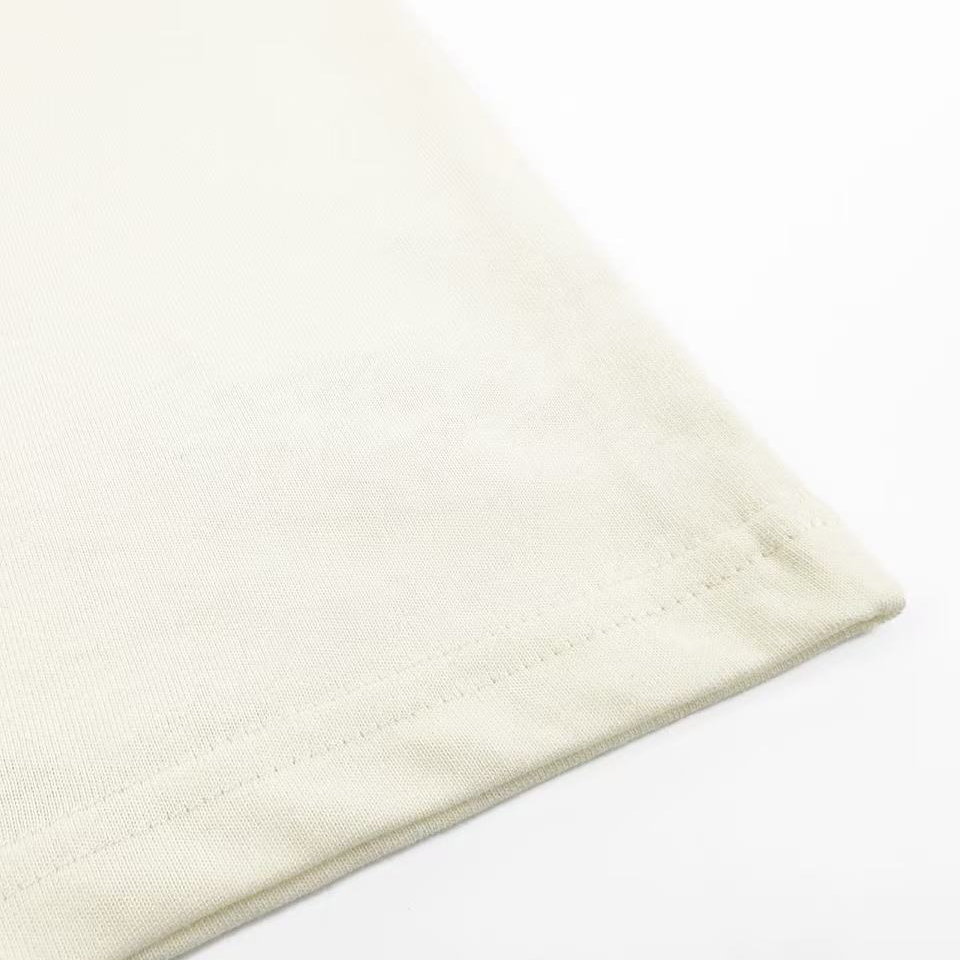 AMI Paris White And Green Cotton Ami De Coeur Knitted Patch T-shirt - DesignerGu