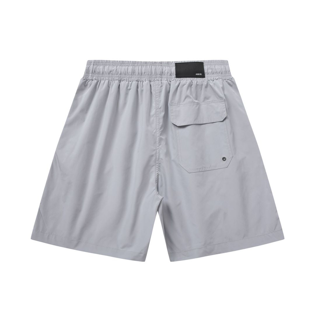 Amiri Stack Logo Swim Shorts In Stretch Limo - DesignerGu