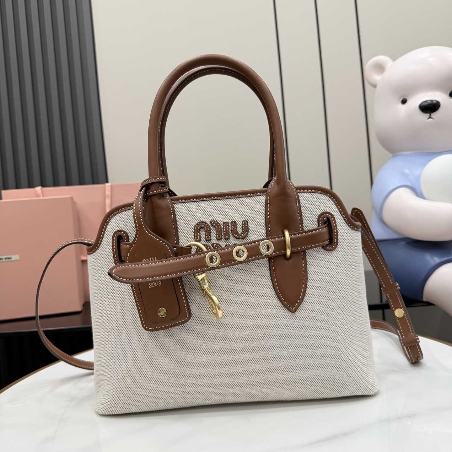 Miu Miu Aventure Canvas And Leather Bag - DesignerGu