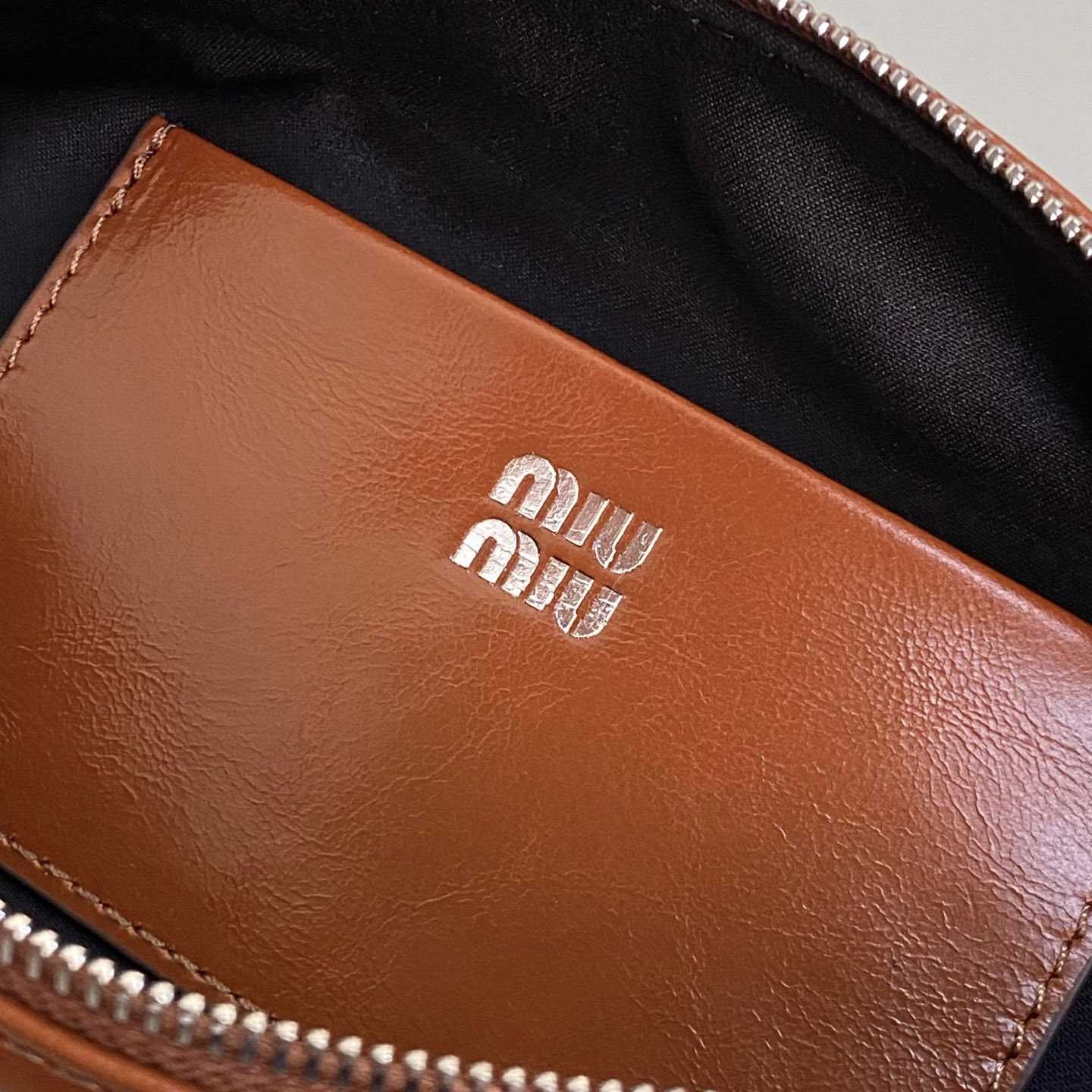 Miu Miu Shiny Leather Pouch - DesignerGu