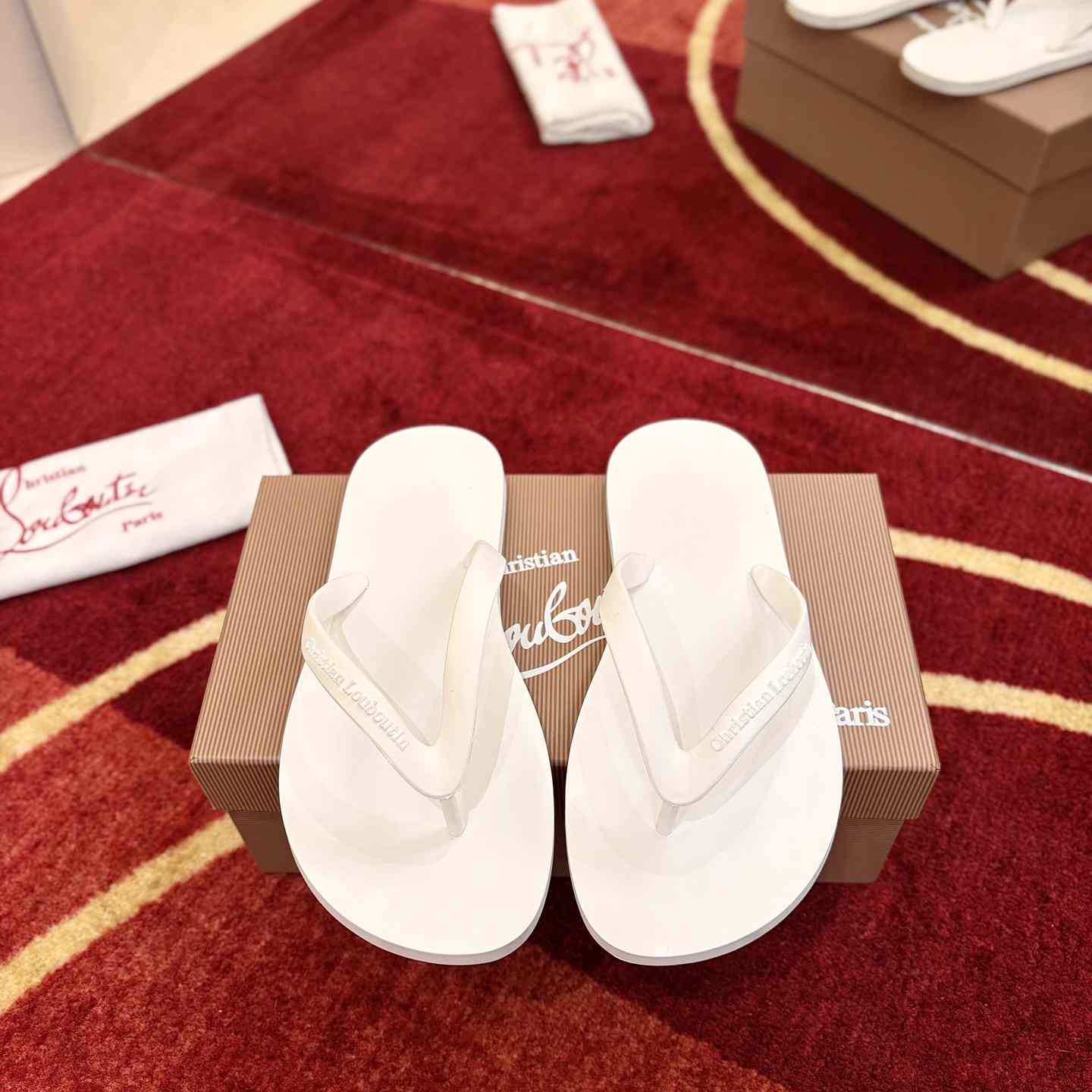 Christian Louboutin Logo Embossed Rubber Flip Flop - DesignerGu