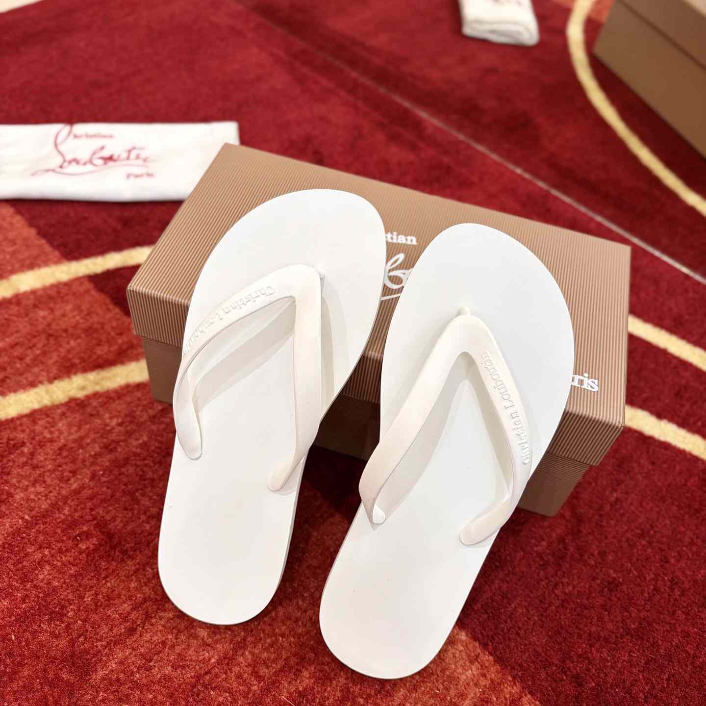Christian Louboutin Logo Embossed Rubber Flip Flop - DesignerGu