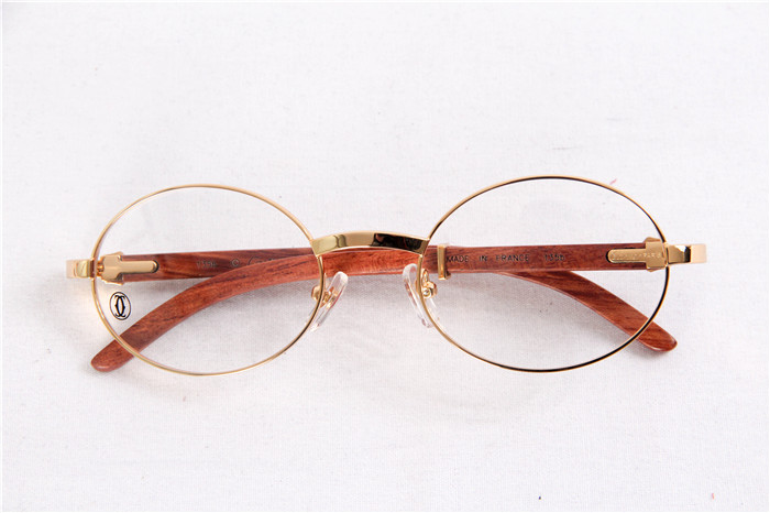 Cartier  51551348 Wood Eyeglasses In Gold - 