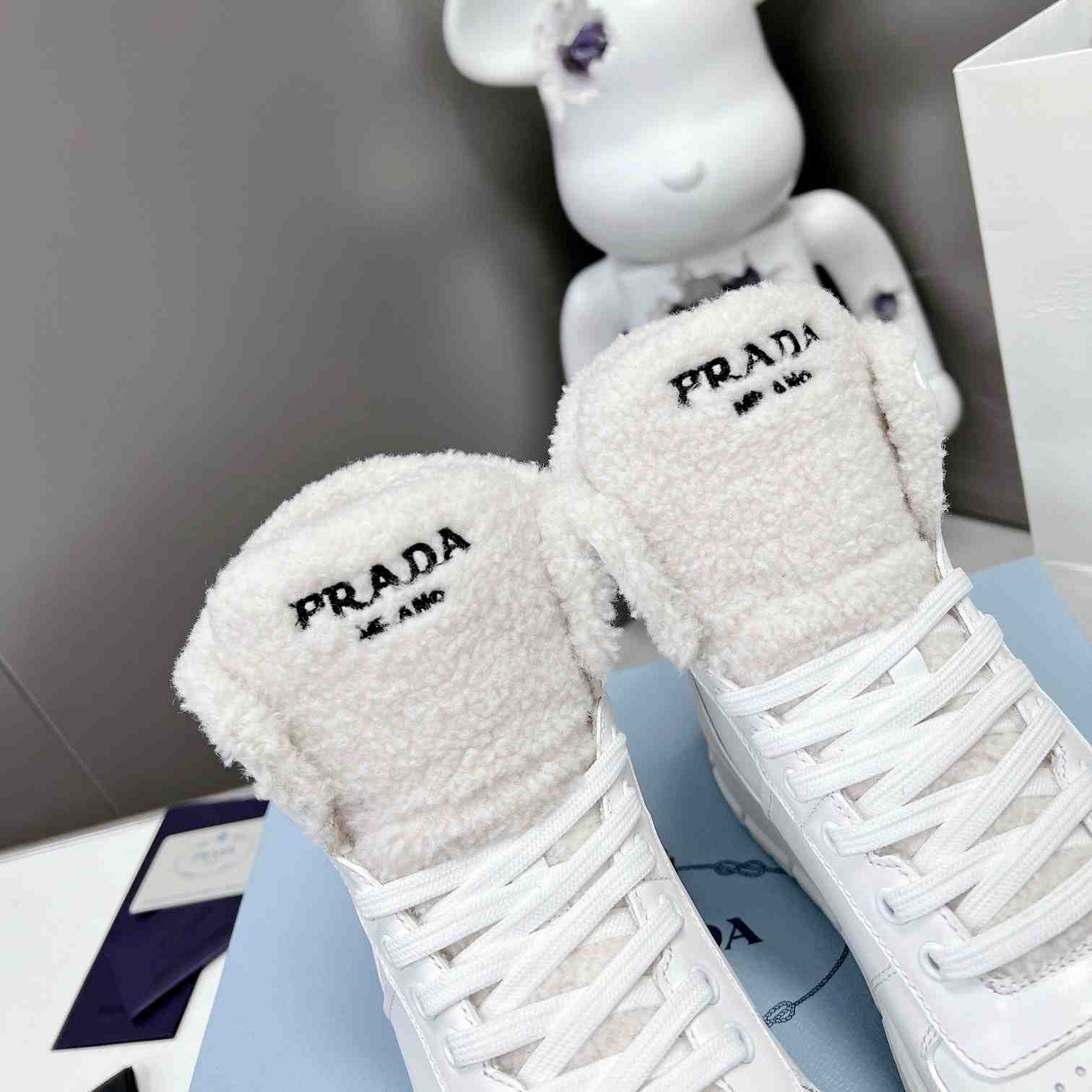 Prada Leather And Shearling High-top Sneakers - 
