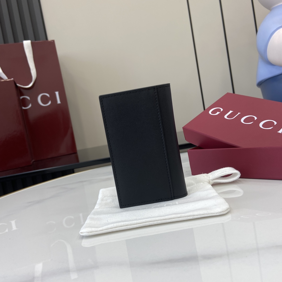 Gucci GG Emblem Bi-fold Embossed Card Case - 
