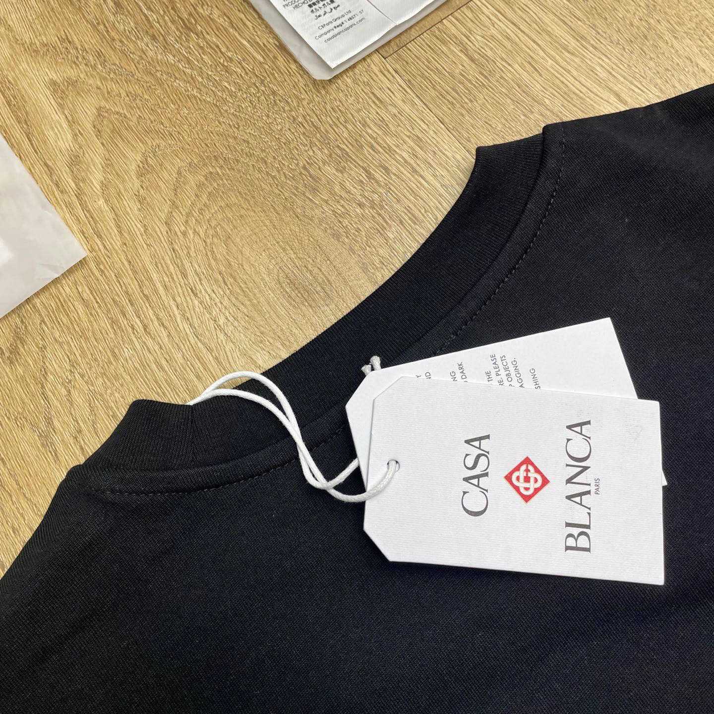 Casablanca Black Innocence Triangle T-shirt C1121 - DesignerGu