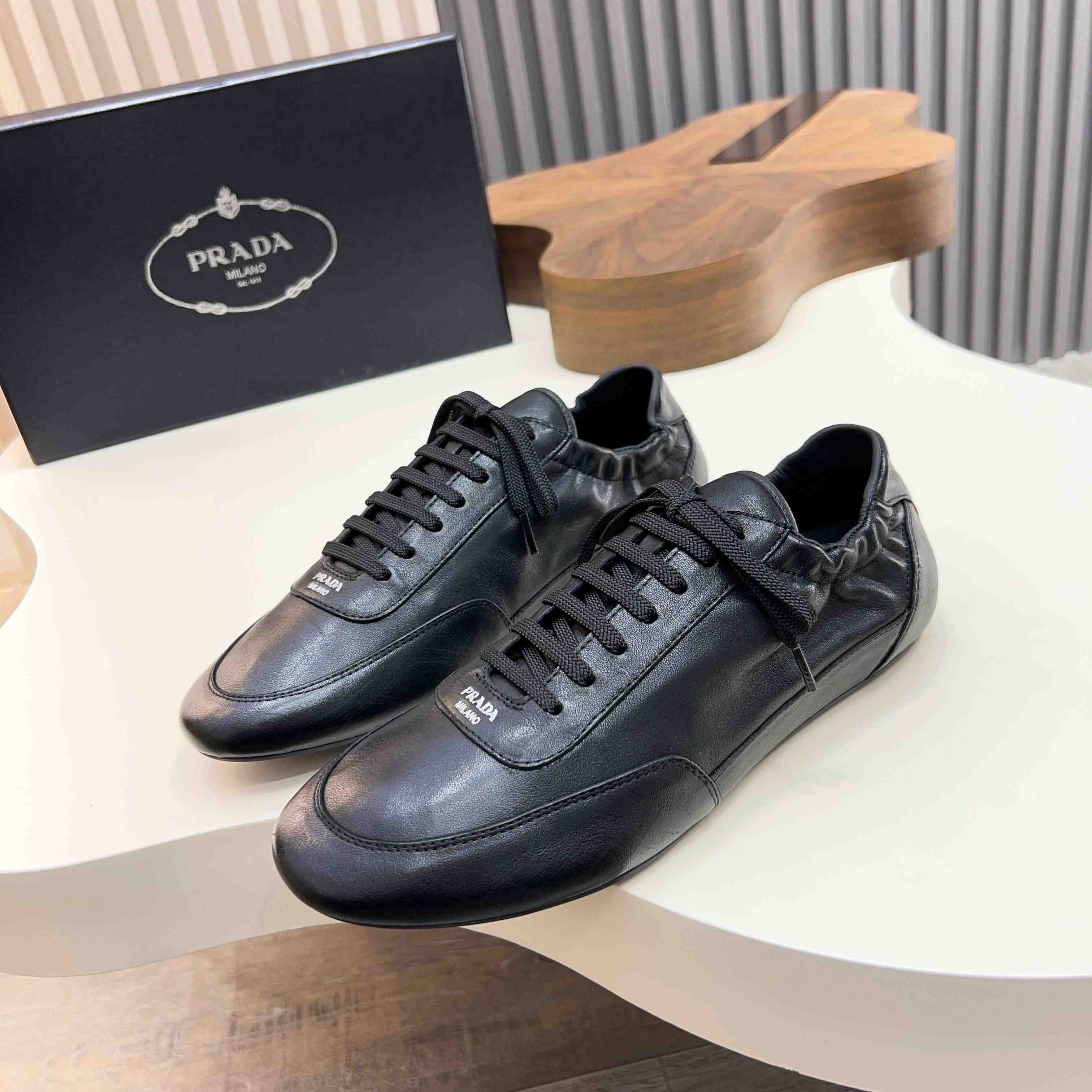 Prada Collapse Leather Sneakers - DesignerGu